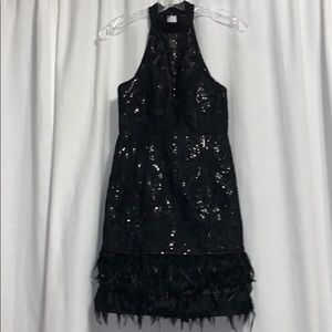 Black Sequin Dress with feather detailing!